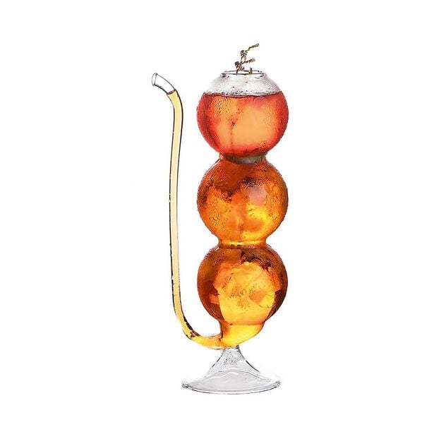 Cocktail glass with spherical shape and straw image number 0